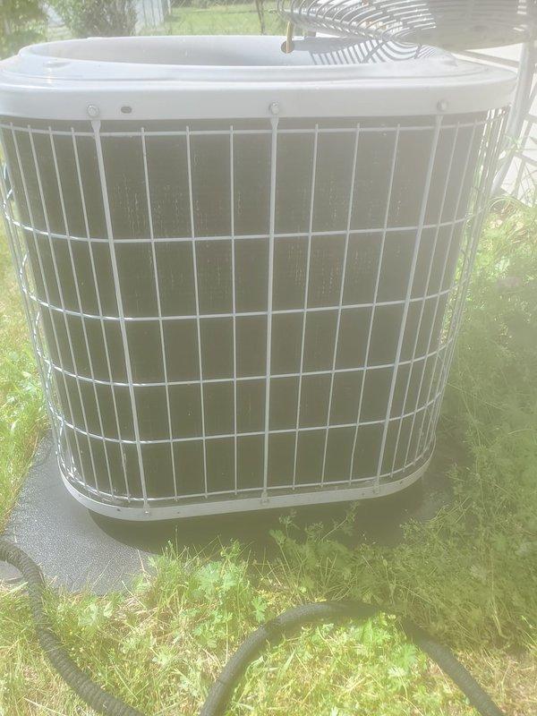 Completed comprehensive cooling system tune-up and maintenance on residential HVAC unit. System was operational upon arrival and confirmed working properly throughout service. Performed standard preventative maintenance procedures on both indoor and outdoor components, including inspection of compressor, refrigerant lines, electrical connections, and condenser unit with protective cage. All copper piping, connections, and system components inspected and found in satisfactory working condition with no issues identified.