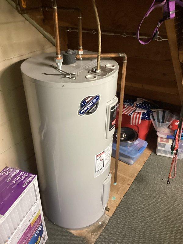 Performed estimate on 12-year-old electric water heater experiencing failure to heat water. Inspected unit and electrical connections at breaker panel, documented existing equipment condition and installation setup. Customer advised unit requires replacement in near-term timeframe due to age and current operational failure.