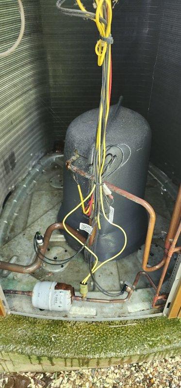 Completed routine preventive maintenance on residential air conditioning system under Worry Free Service Agreement. Performed comprehensive inspection of outdoor condensing unit including electrical connections, refrigerant lines, compressor components, and accumulator assembly. All wiring connections were secure with proper strain relief, copper refrigerant lines showed no signs of damage or leakage, and capacitor tested within normal operating parameters. Cleaned debris from unit base and surrounding area to ensure proper airflow and drainage.