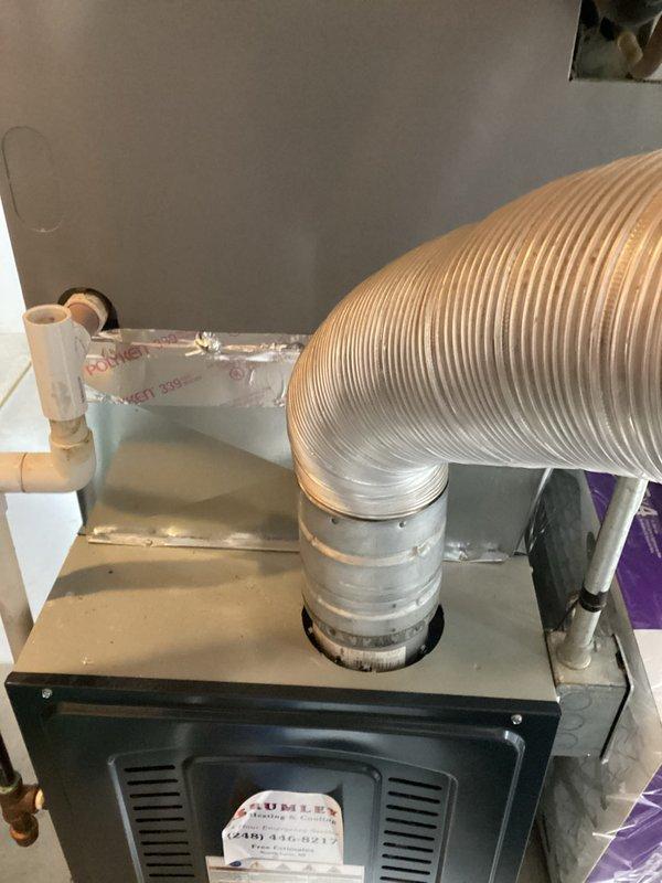 Conducted on-site evaluation for complete HVAC system replacement. Assessed existing air handler unit and ductwork configuration in utility space. System currently operational but requires full replacement due to age and efficiency concerns. Documented existing equipment specifications, including recently replaced furnace component, flexible ductwork connections, condensate drain lines, and PVC piping layout. Provided comprehensive replacement estimate with equipment options and installation scope. Photographed current system configuration for proposal documentation and future reference.