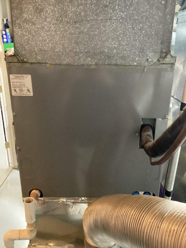 Conducted on-site evaluation for complete HVAC system replacement. Assessed existing air handler unit and ductwork configuration in utility space. System currently operational but requires full replacement due to age and efficiency concerns. Documented existing equipment specifications, including recently replaced furnace component, flexible ductwork connections, condensate drain lines, and PVC piping layout. Provided comprehensive replacement estimate with equipment options and installation scope. Photographed current system configuration for proposal documentation and future reference.