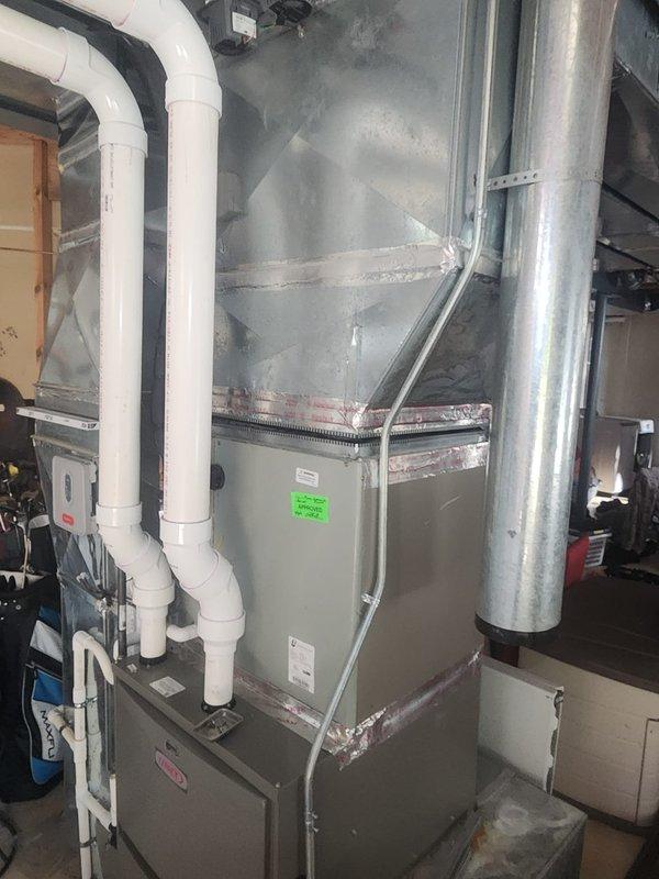 Completed warranty installation of new plenum assembly on residential HVAC system as requested by service technician. Installed metallic ductwork plenum sections with proper sealing using foil tape at all connections, ensuring airtight integration with existing furnace unit and supply duct system. System verified operational with secure ductwork connections and proper airflow throughout installation.