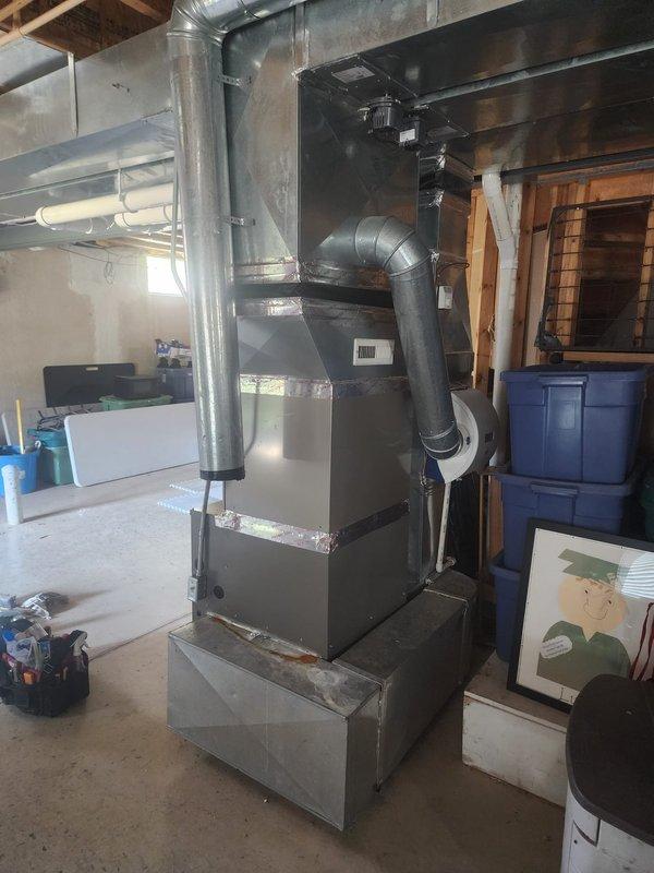 Completed warranty installation of new plenum assembly on residential HVAC system as requested by service technician. Installed metallic ductwork plenum sections with proper sealing using foil tape at all connections, ensuring airtight integration with existing furnace unit and supply duct system. System verified operational with secure ductwork connections and proper airflow throughout installation.