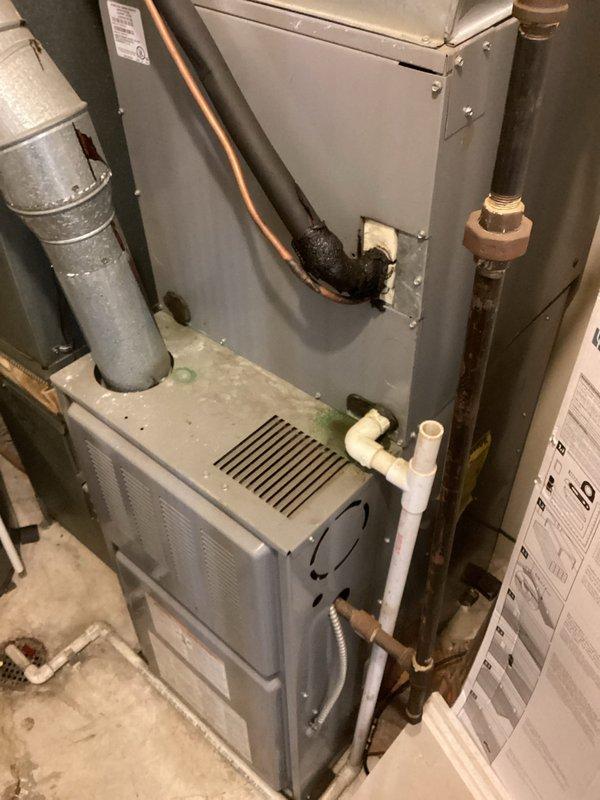 Assessed a non-operational AC wall unit located in a fourth-floor furnace room of a condominium building. The existing system is over 20 years old and has reached the end of its serviceable life. Documented the current HVAC equipment configuration, including the furnace unit, associated ductwork, copper refrigerant lines, and condensate drainage system. Observed aging infrastructure with visible corrosion on metal piping components. Provided a comprehensive replacement estimate for a new AC unit suitable for the existing installation space and mechanical room layout.