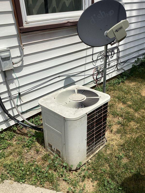 Conducted estimate for replacement of non-functional air conditioning system located in backyard. Current equipment manufactured in 2005 has reached end of service life and requires full replacement. Evaluated existing condenser unit showing significant weathering and age-related deterioration, assessed ductwork and infrastructure compatibility for new system installation.