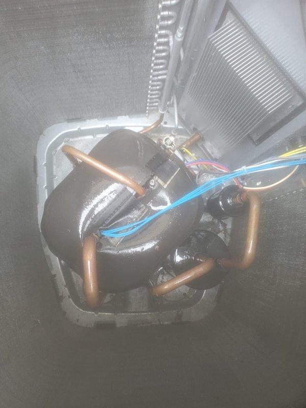 Completed comprehensive cooling system maintenance and tune-up on residential HVAC unit. Inspected indoor evaporator coil assembly, compressor, refrigerant lines, and electrical connections in attic space, confirming all components operating within normal parameters. Serviced outdoor condenser unit, cleaning protective mesh grilles and verifying proper airflow through fan discharge. System tested and confirmed working properly with all safety controls functioning as designed.