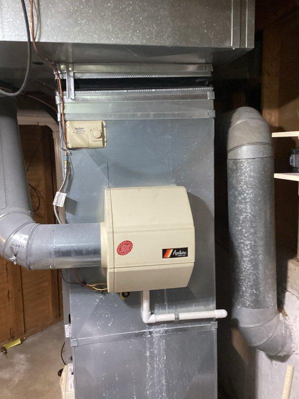 Conducted comprehensive assessment of existing residential HVAC system including Lennox furnace and air conditioning unit located in basement mechanical room. Evaluated current equipment condition, ductwork configuration, humidifier integration, and overall system performance to provide replacement estimate for both heating and cooling components as previously recommended due to non-functional AC system and furnace requiring replacement.