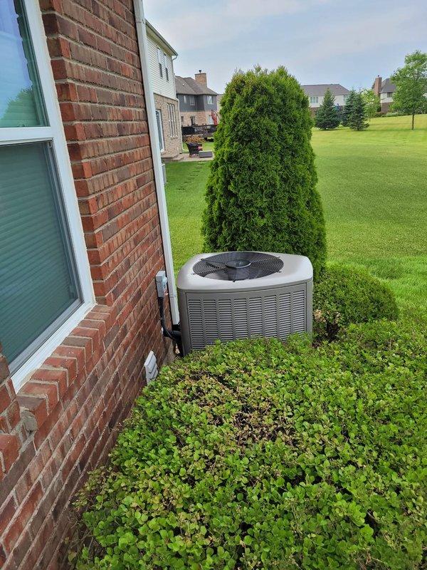 Completed full HVAC system installation including Lennox furnace, Lennox air conditioning condenser unit, and S40 smart thermostat. The outdoor condenser was positioned on a concrete pad against the exterior brick wall with proper clearances maintained for airflow and serviceability. All equipment was installed to manufacturer specifications, electrical connections were completed and verified, refrigerant lines were properly charged, and the thermostat was programmed and tested for proper system operation.