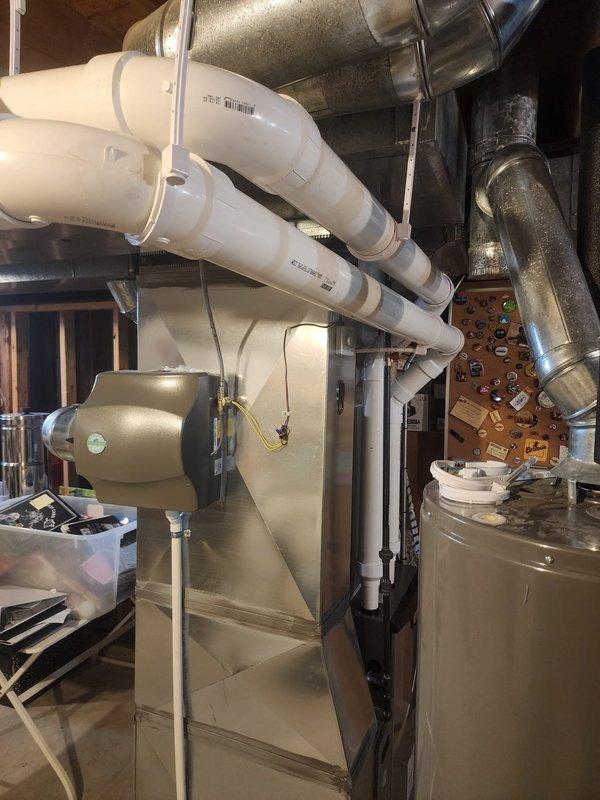 Completed warranty service on HVAC installation addressing ventilation and ductwork deficiencies. Properly aligned canvas connector on supply side of plenum to ensure proper airflow and system operation. Installed missing hangers on furnace PVC venting pipes, maintaining code-compliant maximum spacing of 4 feet on all horizontal runs to prevent sagging and ensure proper drainage. Documented all corrections with photographs per warranty protocol and submitted required follow-up documentation.