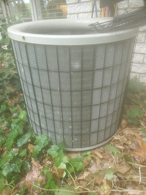 Completed routine maintenance on residential air conditioning system. Inspected outdoor condenser unit, noting normal operational condition with minor debris accumulation around protective grille from surrounding vegetation. Verified expansion tank and refrigerant connections in mechanical enclosure, confirming proper installation and secure fittings. Scheduled follow-up boiler maintenance appointment with customer per service protocol.