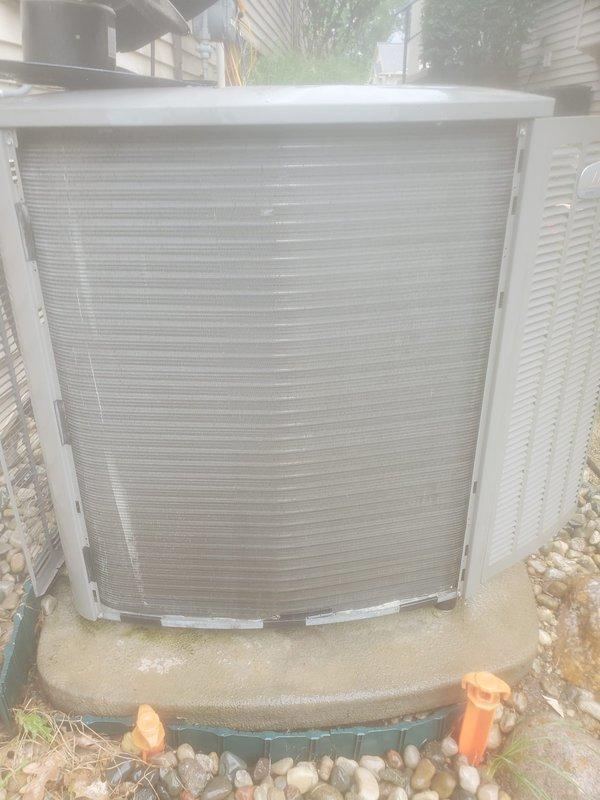 Completed preventive maintenance inspection on residential cooling system under Worry Free Service Agreement. Performed comprehensive evaluation of outdoor condenser unit and indoor air handler components, including inspection of condensate drain pan with active moisture accumulation indicating proper system operation. All equipment found operating within normal parameters with no deficiencies noted.