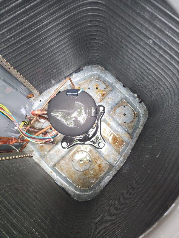 Completed routine cooling season maintenance on residential air conditioning system. Performed comprehensive inspection of outdoor condensing unit, including visual assessment of cabinet condition, airflow components, and refrigerant line connections. Observed normal weathering consistent with outdoor installation, with unit operational and all major components functioning within acceptable parameters. Documented existing surface rust on compressor mounting platform and minor debris accumulation around unit perimeter for future monitoring.