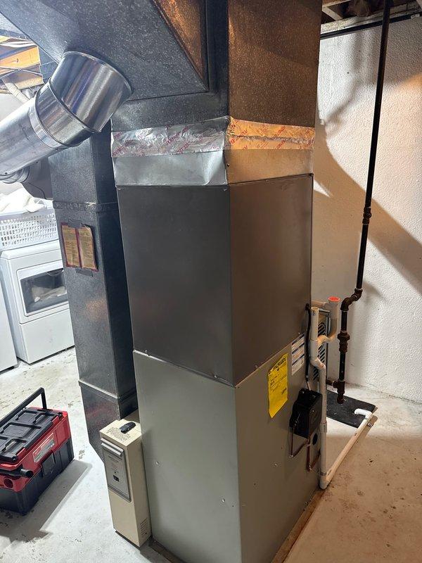 Completed installation of Lennox ML14KC1-030-230A02 air conditioning system with R-454B refrigerant. Unit was installed outdoors and connected to existing indoor furnace via copper refrigerant lines and electrical disconnect. All electrical connections completed per manufacturer specifications at 208/230V, 1-phase, 60Hz operation. System tested and verified operational with proper compressor amperage draw and refrigerant pressures within factory specifications.