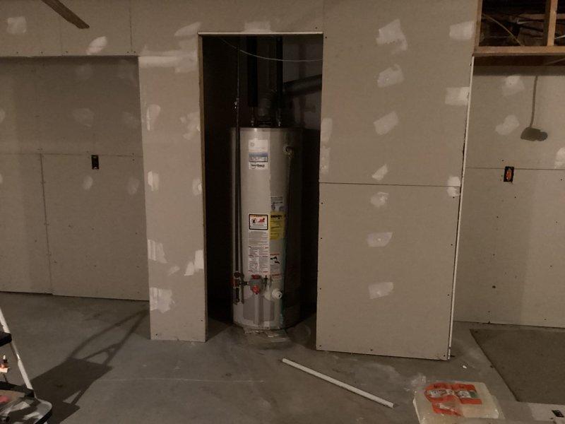 Completed installation of Lennox furnace model 123ANA048-C with R410A refrigerant in basement location. Wired and configured S40 iComfort thermostat to system, integrated existing humidifier to new unit, fabricated and installed equipment base pad, and reinstalled air filter cabinet to ensure proper system operation and accessibility for future maintenance.