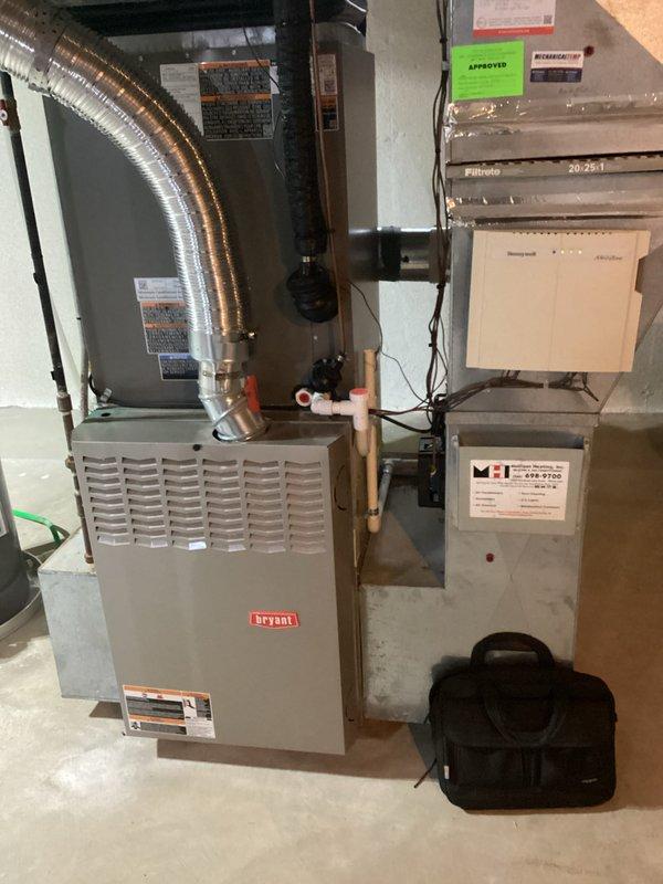 Responded to service call for 22-year-old Bryant furnace system experiencing blower motor and wheel failure. Upon inspection, confirmed blower motor was inoperative and wheel showed signs of significant wear consistent with age of unit. Provided comprehensive estimate for complete HVAC system replacement given the advanced age of existing equipment and cost-effectiveness of full system upgrade versus component repair. Documented existing installation including furnace, ductwork connections, and auxiliary components for replacement specifications.