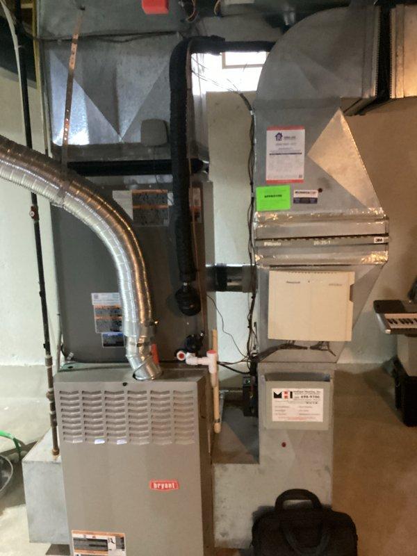 Responded to service call for 22-year-old Bryant furnace system experiencing blower motor and wheel failure. Upon inspection, confirmed blower motor was inoperative and wheel showed signs of significant wear consistent with age of unit. Provided comprehensive estimate for complete HVAC system replacement given the advanced age of existing equipment and cost-effectiveness of full system upgrade versus component repair. Documented existing installation including furnace, ductwork connections, and auxiliary components for replacement specifications.