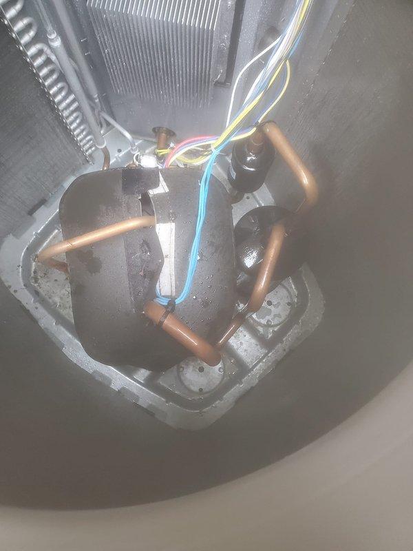 Completed routine AC maintenance on a split system cooling unit. Performed inspection of outdoor condenser unit including cleaning of filter screen panel which showed moderate dust and debris accumulation, examined refrigerant lines and electrical connections at indoor evaporator coil, and verified proper system operation with all components functioning within normal parameters.