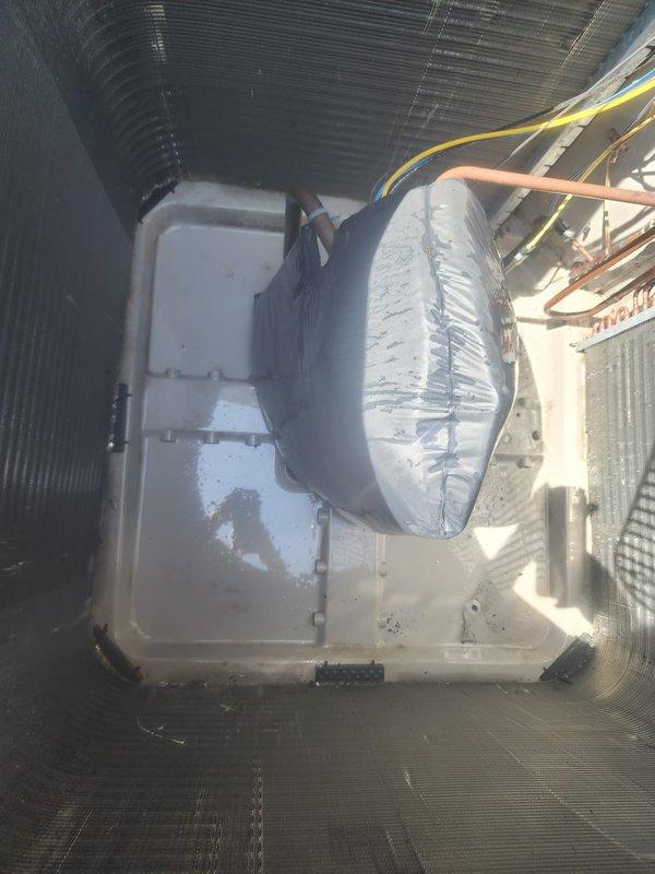 Responded to no-cooling complaint on Bryant central air conditioning system. Upon arrival, confirmed outdoor condenser blower motor was not operating. Inspected outdoor unit and indoor air handler components. Diagnosed failed condenser fan motor preventing heat rejection and system operation. Replaced defective outdoor blower motor, verified proper electrical connections, and tested system operation. Unit now cooling properly with outdoor fan running at correct speed and refrigerant pressures within normal range.