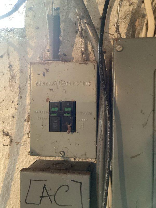 Provided estimate for electric water heater replacement serving well water system. Assessed existing cylindrical tank water heater in basement area with incoming cold water supply lines and evaluated electrical service at General Electric panel to confirm adequate capacity for new unit installation. Documented current equipment configuration including pipe connections, electrical conduit routing, and available workspace for replacement procedures.