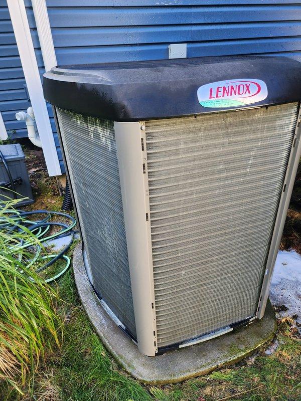 Completed comprehensive cooling season maintenance on Lennox outdoor condensing unit. System was operational upon arrival and confirmed to be working properly. Performed standard tune-up protocol including inspection of compressor assembly, refrigerant lines, and electrical connections. Observed normal weathering and outdoor debris accumulation on unit exterior and coil fins consistent with seasonal operation. Verified all copper refrigerant lines, electrical wiring, and component connections are secure and functioning as designed. Unit remains in good working condition and ready for continued cooling operation.