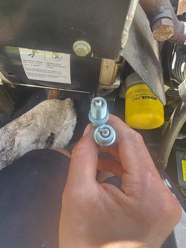 Completed scheduled maintenance on Kohler residential generator unit. Performed routine service including spark plug replacement and oil filter change. Inspected all fluid levels, electrical connections, and mechanical components. Unit tested and operating within normal parameters upon completion.