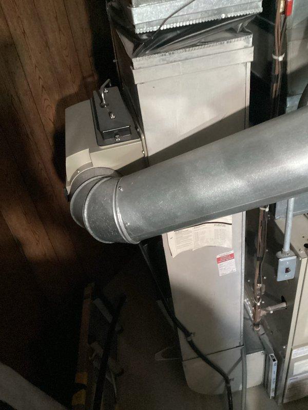 Provided comprehensive estimate for complete HVAC system replacement of 30-year-old equipment currently in operational condition. Evaluated existing basement installation including furnace, air handler, and associated ductwork system. Assessed mechanical room configuration with Arcoaire equipment, refrigerant lines, PVC condensate drainage, and electrical components to determine specifications for new system installation including natural gas furnace and compatible cooling unit.