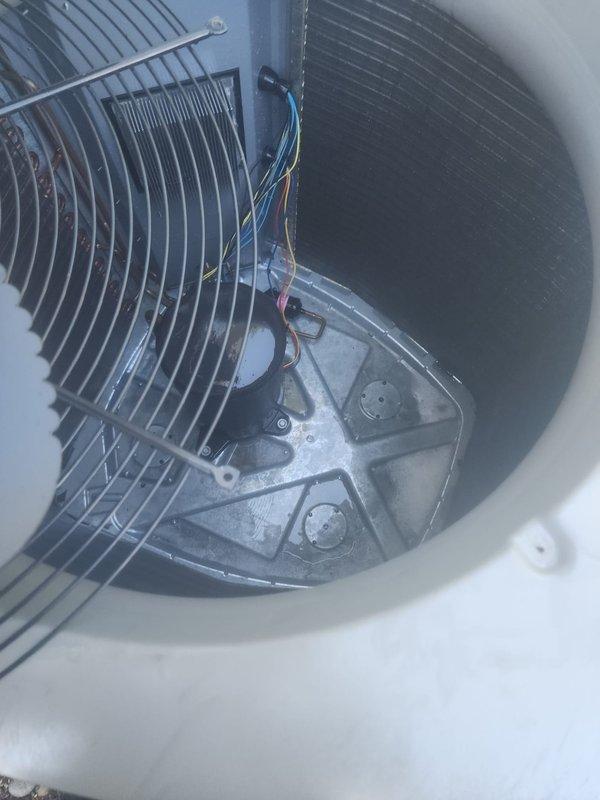 Completed routine preventative maintenance on residential air conditioning system under Worry Free Service Agreement. Performed comprehensive inspection of outdoor condensing unit, including fan motor assembly, condenser coils, and protective housing components. Verified proper operation of top-mounted fan, checked electrical connections, and confirmed unit functionality for optimal cooling performance.