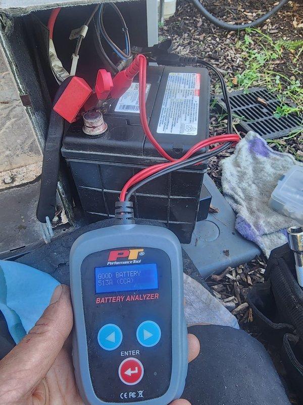 Completed scheduled generator maintenance including comprehensive battery testing and capacitor replacement. Battery analyzer confirmed proper voltage and charging system performance with "GOOD BATTERY" status at 513V DC. Removed and replaced dual capacitors on associated HVAC equipment, with old components showing signs of wear. All electrical connections were inspected, tested, and secured. Equipment was returned to full operational status and tested under load to verify proper function.