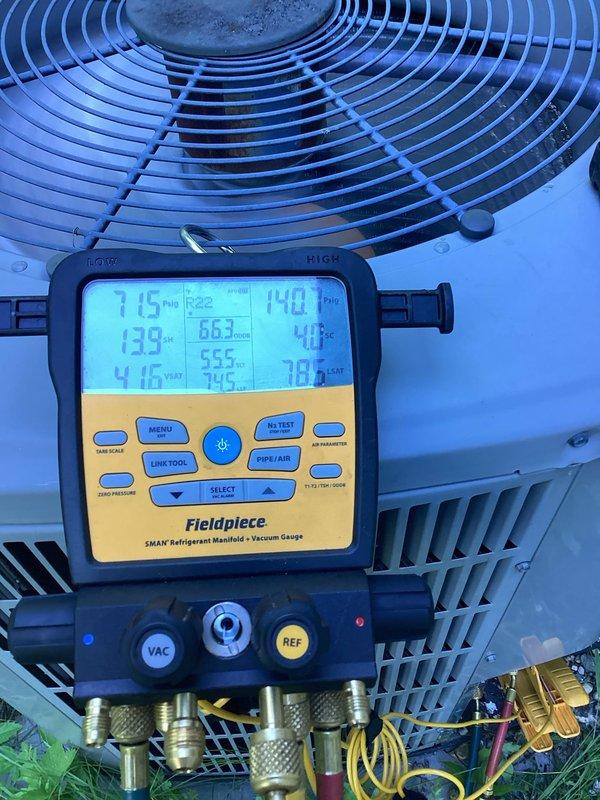 Responded to no cooling complaint where homeowner suspected a switch had been turned off. Upon arrival, located outdoor condensing unit behind residence with overgrown vegetation around equipment. Connected Fieldpiece diagnostic manifold to measure system pressures and temperatures. Readings indicated unit was operating with superteat of 115°F, discharge temperature of 139°F, and suction temperature of 41°F. Identified that system had been inadvertently switched off at disconnect. Restored power to unit and verified proper operation. System returned to normal cooling operation with appropriate temperature differential and refrigerant pressures within manufacturer specifications.