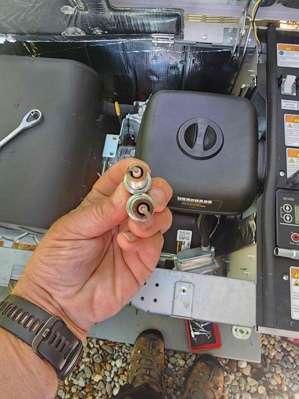 Completed scheduled generator maintenance inspection and service. Documented equipment identification including power code inlet connector harness with serial and part numbers for maintenance records. Replaced two worn capacitors from the generator's electrical system to ensure proper starting and running capabilities. Verified all electrical connections, inspected wiring harness integrity, and confirmed proper operation of motor components following capacitor replacement.