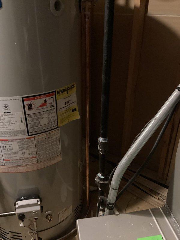 Completed warranty service on Bradford White water heater model RG275B6N to bring relief valve discharge pipe into compliance with Chapter 28 of the 2015 State of Michigan Residential Code. Inspected installation, verified proper discharge piping configuration, and documented work with photographs per warranty requirements.