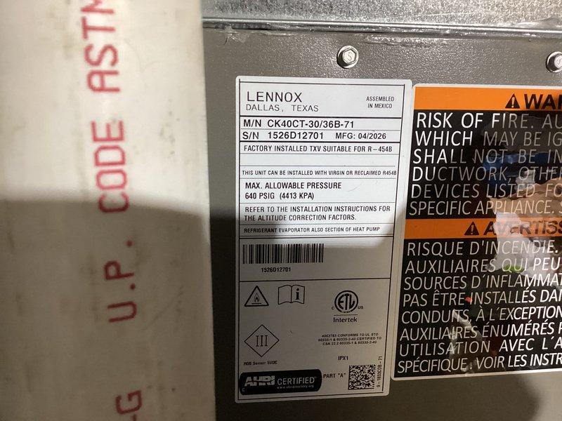 # Complete HVAC System Installation

Completed full residential HVAC system installation including Lennox furnace model CK40CT-30/36B-71, matching Lennox air conditioning condenser unit, and S40 smart thermostat. 

Installed indoor furnace unit with proper venting, gas connections, and electrical hookups per manufacturer specifications and local building codes. Verified all safety labels, warning placards, and manufacturer data plates are properly affixed and visible. Confirmed furnace rated for maximum allowable pressure of 640 PSIG (4413 KPA) with manufacturing date of April 2026.

Positioned outdoor condenser unit on level concrete pad in backyard location with adequate clearance for airflow and service access. Ran refrigerant lines and electrical conduit from outdoor unit to indoor air handler. Installed line set with proper insulation and secured all penetrations through building envelope. Connected condensate drain lines with appropriate trap and termination.

Mounted S40 thermos