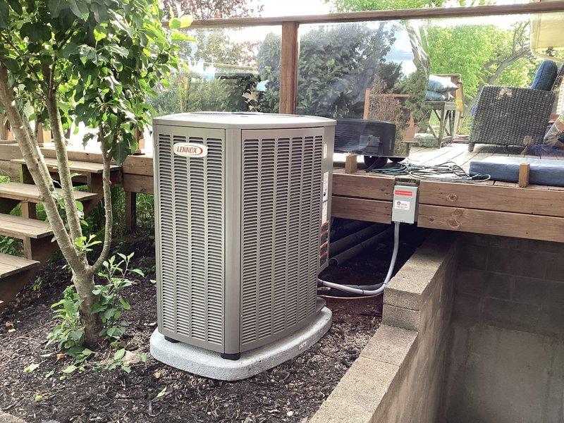 # Complete HVAC System Installation

Completed full residential HVAC system installation including Lennox furnace model CK40CT-30/36B-71, matching Lennox air conditioning condenser unit, and S40 smart thermostat. 

Installed indoor furnace unit with proper venting, gas connections, and electrical hookups per manufacturer specifications and local building codes. Verified all safety labels, warning placards, and manufacturer data plates are properly affixed and visible. Confirmed furnace rated for maximum allowable pressure of 640 PSIG (4413 KPA) with manufacturing date of April 2026.

Positioned outdoor condenser unit on level concrete pad in backyard location with adequate clearance for airflow and service access. Ran refrigerant lines and electrical conduit from outdoor unit to indoor air handler. Installed line set with proper insulation and secured all penetrations through building envelope. Connected condensate drain lines with appropriate trap and termination.

Mounted S40 thermos