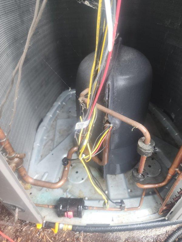 Completed scheduled AC maintenance on residential cooling system. Performed comprehensive inspection of condensing unit, verifying proper operation of compressor, refrigerant lines, and electrical connections. All copper refrigerant lines showed normal patina with secure connections and proper routing throughout the unit. Verified electrical wiring including control and power cables were properly connected with no signs of damage or wear. Checked compressor mounting and vibration isolation grommets for proper function. Inspected exterior grill and louvers, confirming adequate airflow and clean condition. Unit operating within normal parameters with no issues identified.