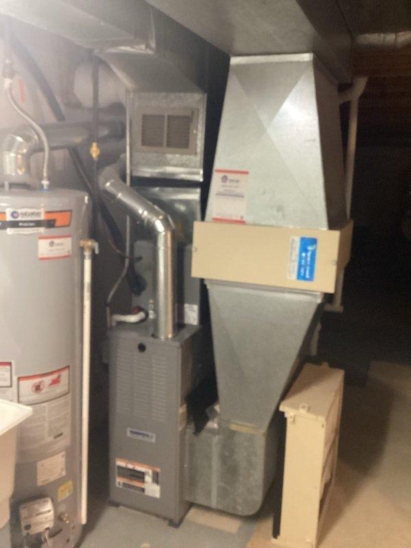 Performed complete HVAC system replacement in residential mechanical room due to failed compressor and refrigerant loss on obsolete R22 system. Removed existing air handler and condensing unit, installed new high-efficiency equipment with updated ductwork connections, and documented pre-existing conditions including deteriorated compressor components that rendered repair cost-prohibitive.