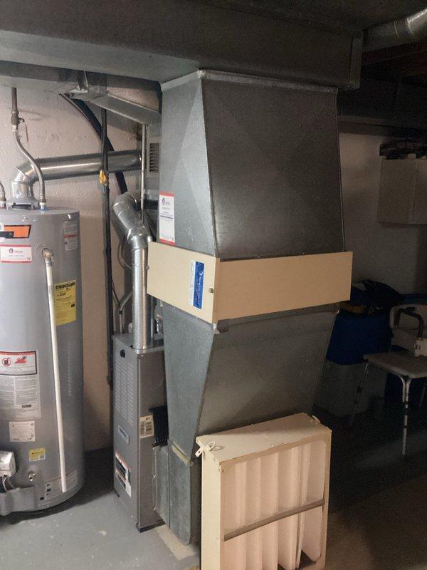 Performed complete HVAC system replacement in residential mechanical room due to failed compressor and refrigerant loss on obsolete R22 system. Removed existing air handler and condensing unit, installed new high-efficiency equipment with updated ductwork connections, and documented pre-existing conditions including deteriorated compressor components that rendered repair cost-prohibitive.