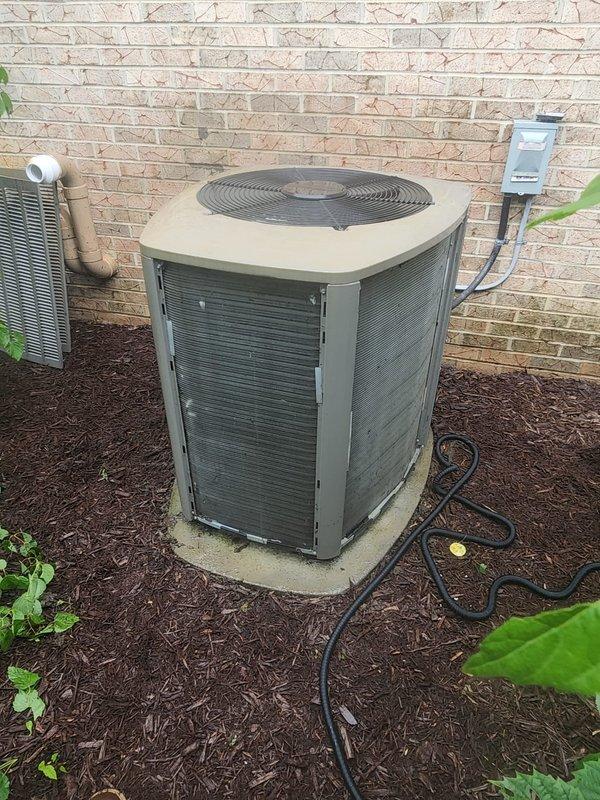 Replaced failed 4-ton compressor on residential outdoor condensing unit. Recovered refrigerant, removed defective compressor, installed new unit, evacuated system, and recharged to manufacturer specifications. Verified proper operation of all electrical connections and confirmed system cooling performance upon completion.