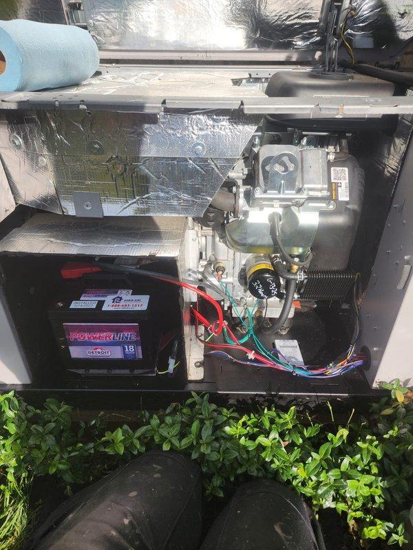 Performed scheduled maintenance on standby generator unit including comprehensive inspection of internal components and electrical connections. Accessed control panel to verify proper wire terminations on motor assembly, inspected battery backup system for charge level and secure mounting, and tested service valves with appropriate fittings to ensure proper refrigerant port functionality. All internal components found in satisfactory operating condition with no immediate repairs required.