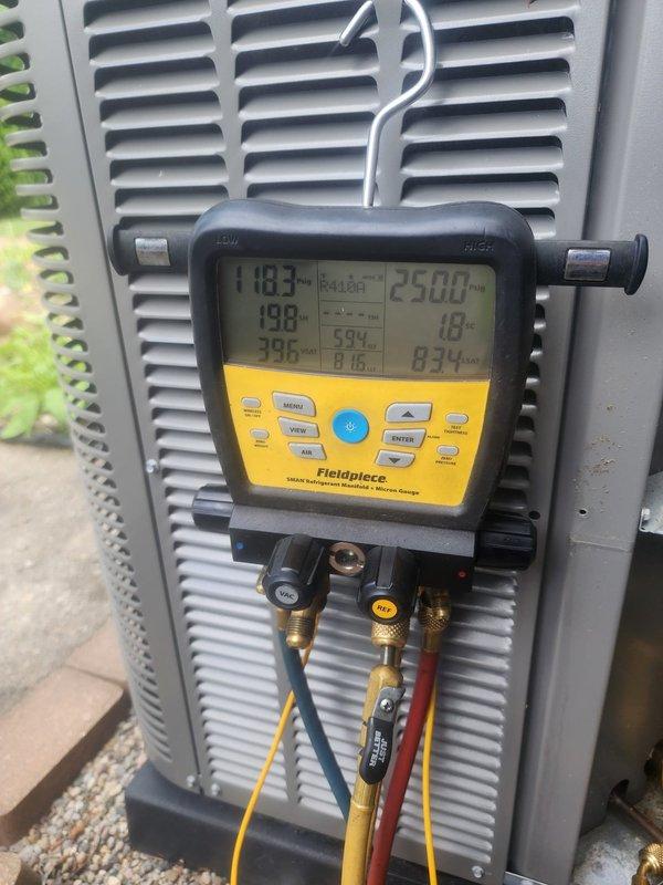 Responded to no cooling complaint at residential property. Upon arrival, connected manifold gauges to outdoor condensing unit and performed system diagnostics. Measured refrigerant pressures and temperatures to assess system performance. Inspected compressor, refrigerant lines, and interior components of condensing unit. Determined system required maintenance service and recommended scheduling preventative maintenance with new homeowner to ensure optimal system performance and longevity.