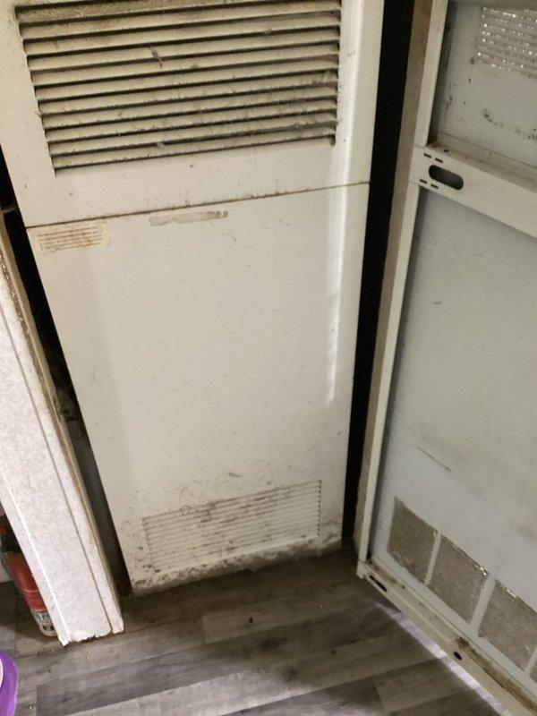 Conducted comprehensive HVAC system evaluation for equipment replacement estimate. Assessed existing dual air handler configuration, documented current unit conditions showing age-related wear and dust accumulation, and evaluated electrical service panel capacity with existing circuit breaker arrangement to determine compatibility requirements for new system installation.