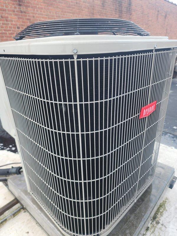 Completed final commercial Worry Free Service Agreement cooling maintenance visit on rooftop HVAC unit. Performed comprehensive inspection of cylindrical condenser unit with vertical fin design, verified operational status of all components including motor assembly, refrigerant lines, electrical connections, and heat exchanger coil. Unit found in good working condition with all systems operating within normal parameters.