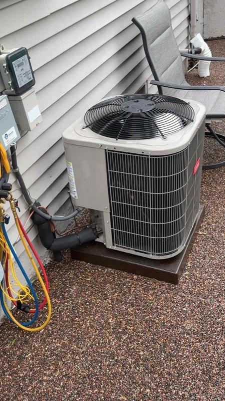 Reconnected residential air conditioning system units 1-5 and restored power to the outdoor condenser. Verified proper electrical connections at disconnect box, confirmed refrigerant line connections were secure, and tested system operation to ensure cooling cycle initiated correctly.