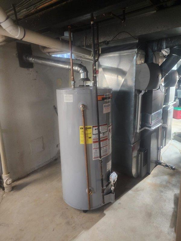 Completed warranty service to address electrical code violations identified during inspection of newly installed HVAC system in basement utility area. Installed GFCI protection for receptacle serving furnace in unfinished space per MRC E3902.5 and NEC 210.8(A)(5) requirements. Added protective bushing to conduit termination where NM cable enters to prevent conductor damage, ensuring compliance with NEC 334.15(B) specifications.