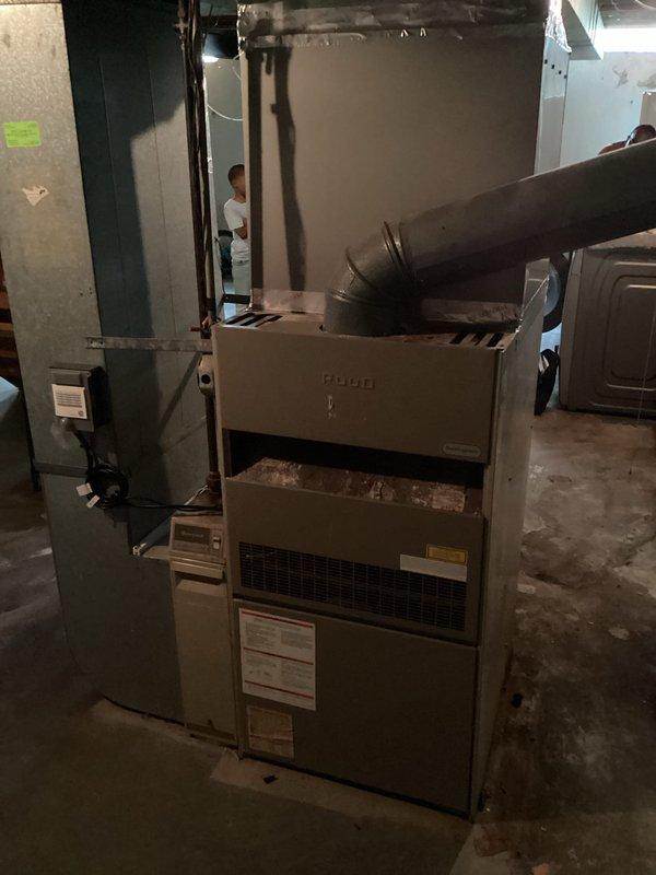 Completed estimate for furnace replacement on 30+ year old Ruud unit with failing blower motor exhibiting extremely weak performance and imminent failure risk. Non-functional furnace switch also documented during assessment. Provided replacement options to address aging equipment and component failures in basement mechanical room installation.