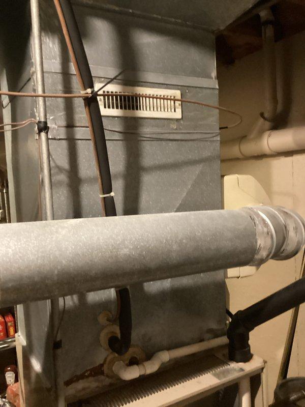 Provided replacement estimate for 27-year-old furnace that was experiencing refrigerant leakage and severe rust deterioration rendering the unit inoperable. Assessed existing natural gas furnace installation, ductwork configuration, and electrical panel capacity to determine proper equipment specifications and installation requirements for replacement system.