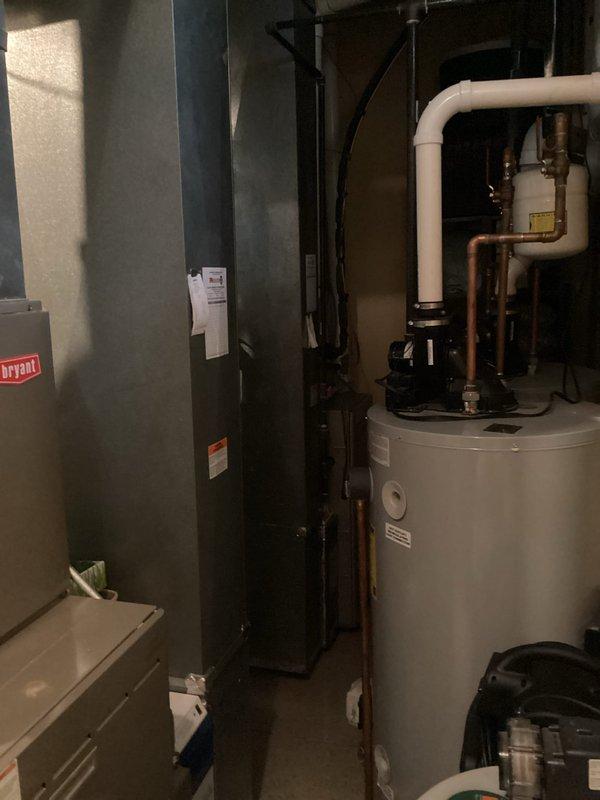 Provided comprehensive estimate for complete replacement of two full HVAC systems serving the residence. Existing equipment includes 20-year-old Bryant furnace and air conditioning system currently operational but at end of expected service life. Assessed basement mechanical room installation including furnace, air handler, refrigerant lines, condensate drainage system, and associated ductwork to determine replacement specifications and requirements for new high-efficiency heating and cooling systems.