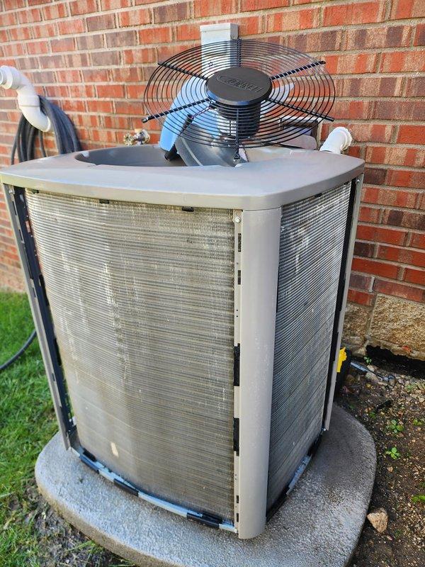 Completed comprehensive AC maintenance inspection on residential split system unit. Performed internal assessment of evaporator coil assembly, refrigerant line connections, and compressor operation within air handler cabinet. Verified proper refrigerant line insulation, drain pan condition, and electrical connections. Inspected outdoor condenser unit including fan motor operation, protective grilles, and cabinet integrity. All components found operating within normal parameters with no immediate service needs identified. System running efficiently with proper airflow and cooling cycle performance.