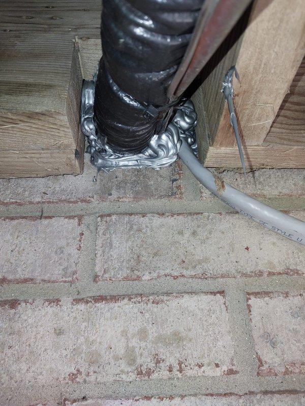 Completed callback service to address rodent entry point discovered following recent air conditioner installation. Sealed penetration opening under deck where flexible ductwork passes through wooden structure using metallic foil tape and expanding foam to create weatherproof barrier and prevent pest intrusion. Modified and reinstalled humidifier bypass to accommodate new supply plenum configuration on 3-ton Lennox air conditioning system. Verified all electrical and refrigerant connections secure, system operational and performing to manufacturer specifications.