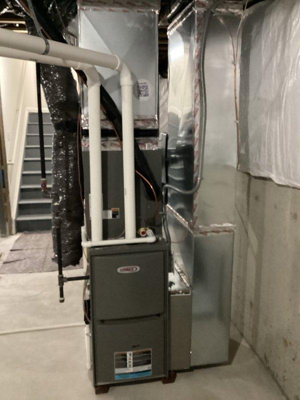 Completed comprehensive estimate for replacement of storm-damaged HVAC system in residential basement installation. Existing Lennox furnace system, only two years old, sustained severe damage requiring full replacement evaluation. Assessed all components including furnace unit, ductwork distribution system, PVC venting infrastructure, and associated mechanical equipment to determine scope of replacement work needed due to storm damage.