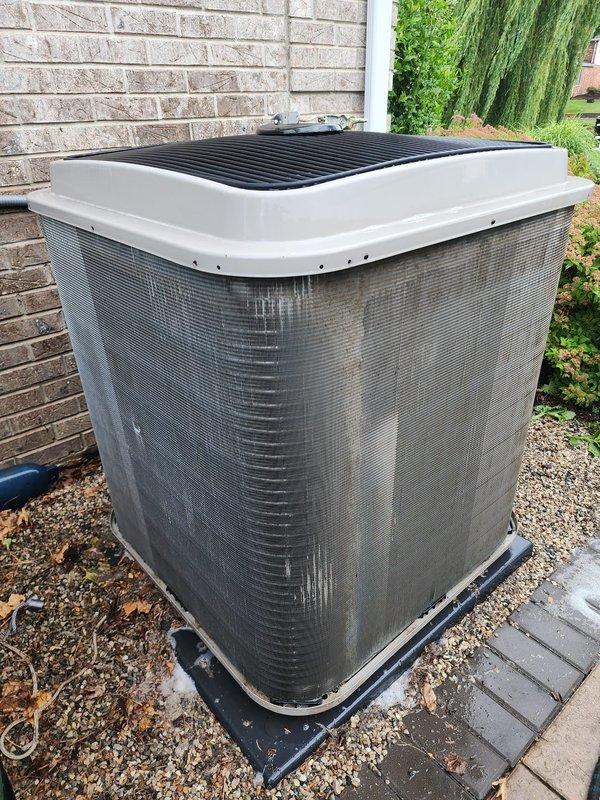 Completed seasonal cooling maintenance tune-up on outdoor AC unit. System was operational upon arrival and confirmed to be working properly. Performed comprehensive inspection of condenser unit, including examination of compressor, refrigerant lines, electrical connections, and protective mesh screening. All components found to be in good working condition with no deficiencies noted. Unit is ready for continued operation.